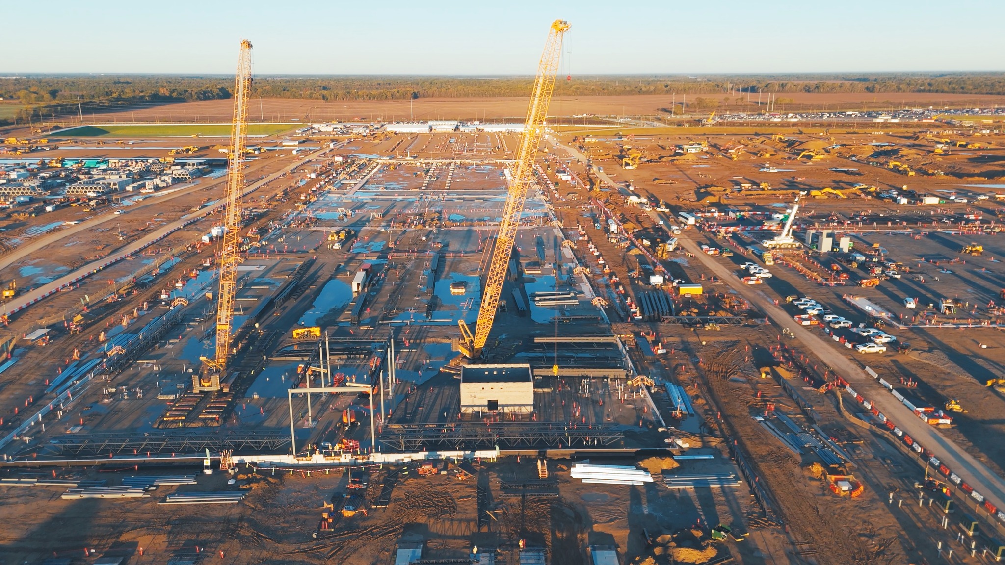 Large mission-critical construction site with cranes and active work areas